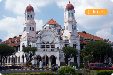 Historic Sam Poo Kong temple with red domes and white architecture in Semarang